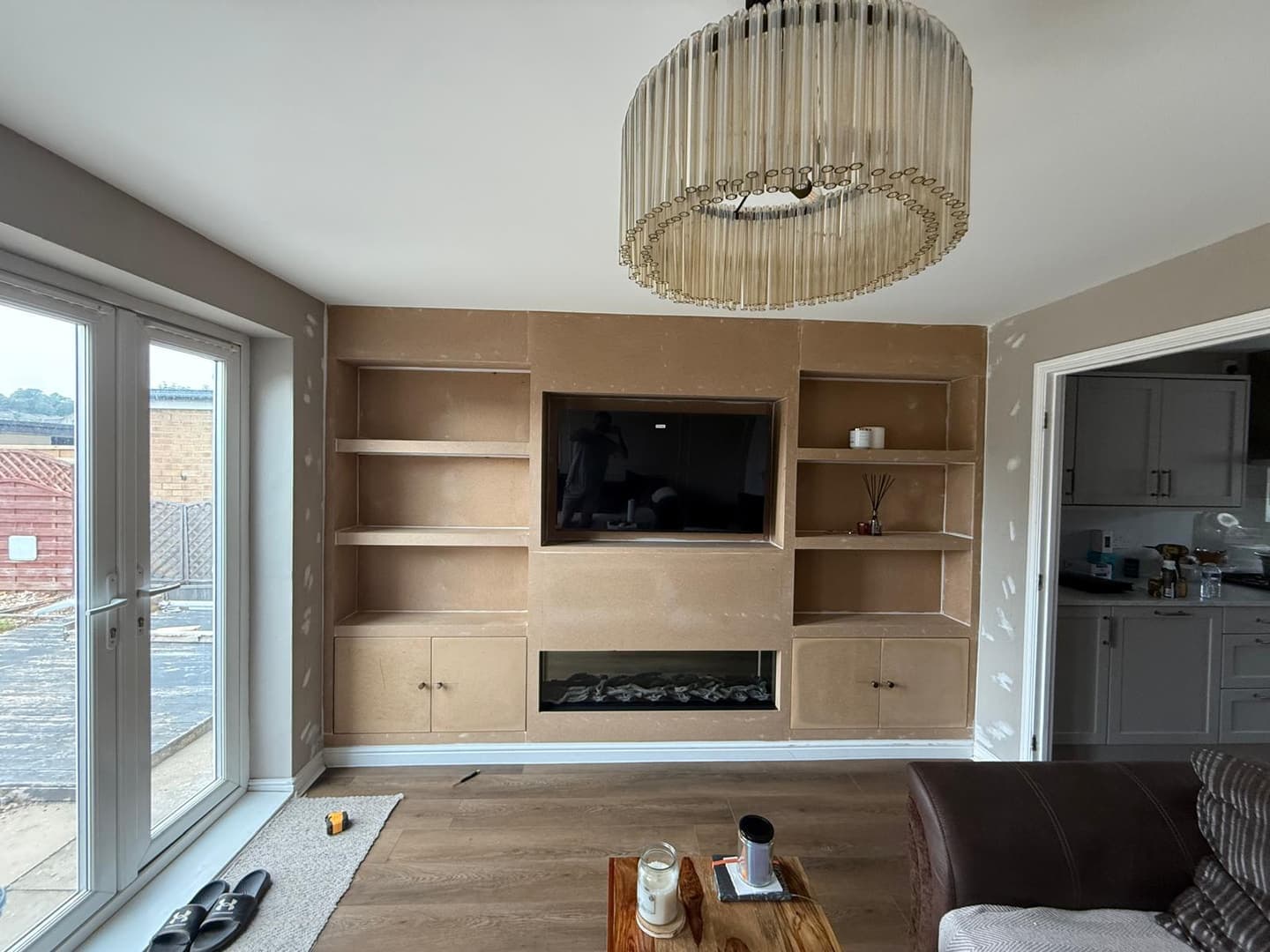 Fitted media wall and alcove joinery, during