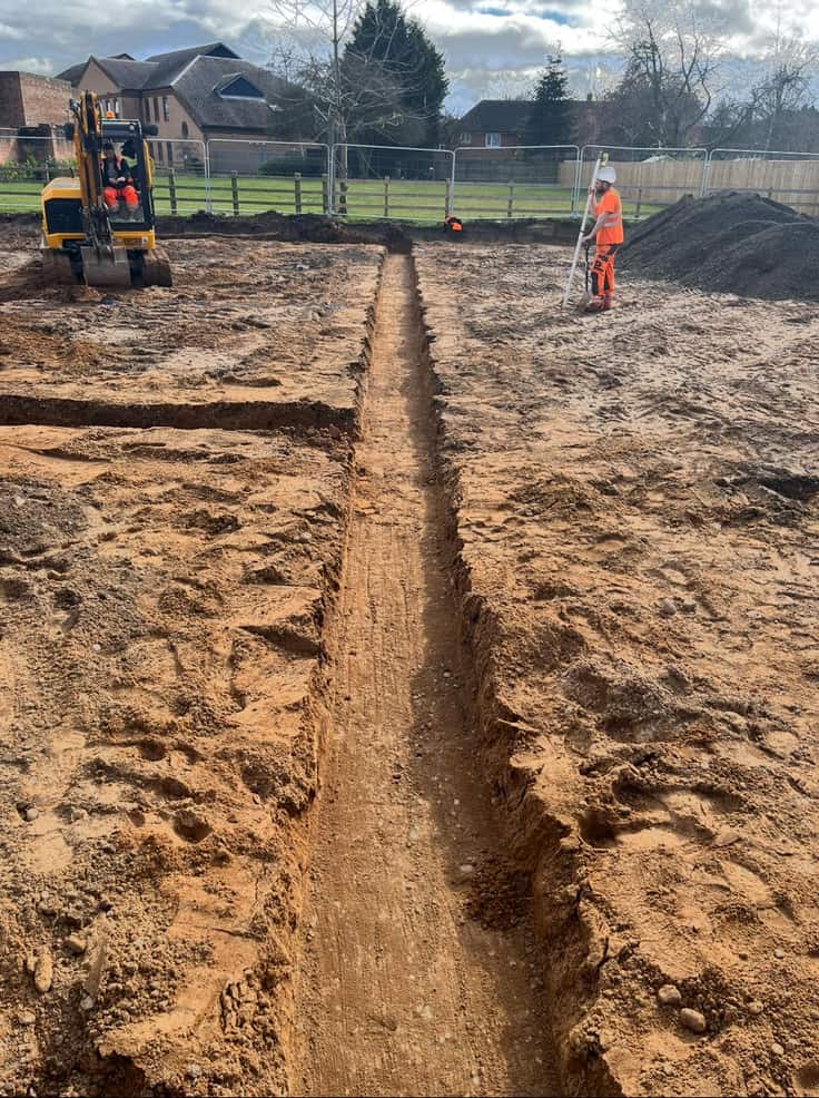 Service trench dug across a site
