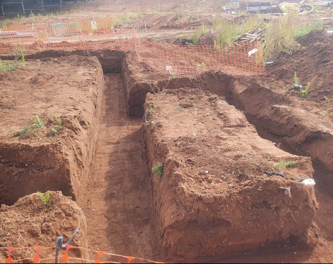 Deep foundation trenches cut into clay