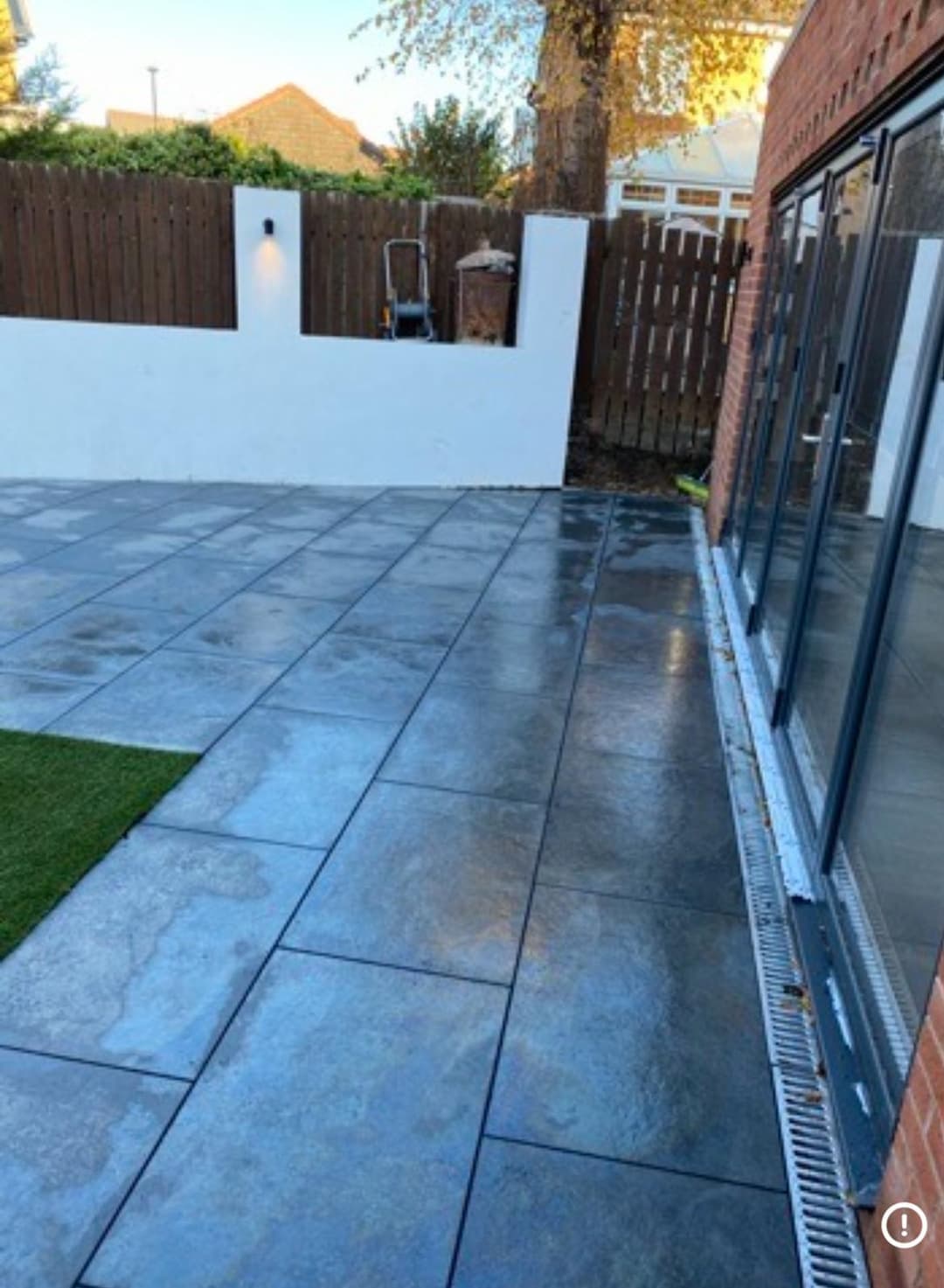 Porcelain patio and rendered walls, rear garden