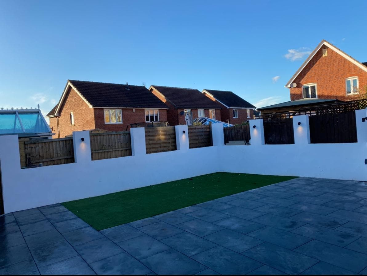 Whole rear garden rebuilt, patio, walls and lawn