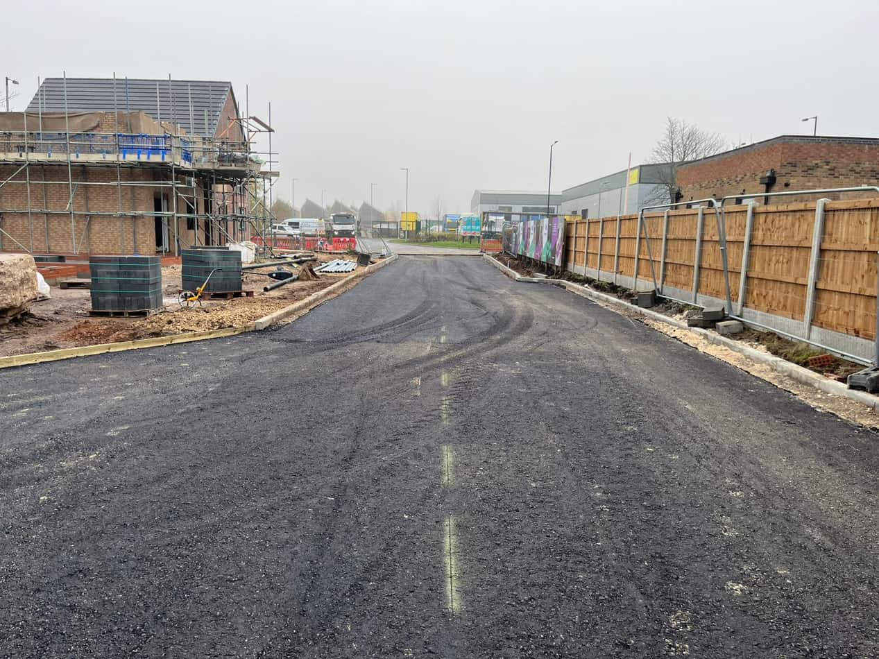 Estate road surfaced and line marked